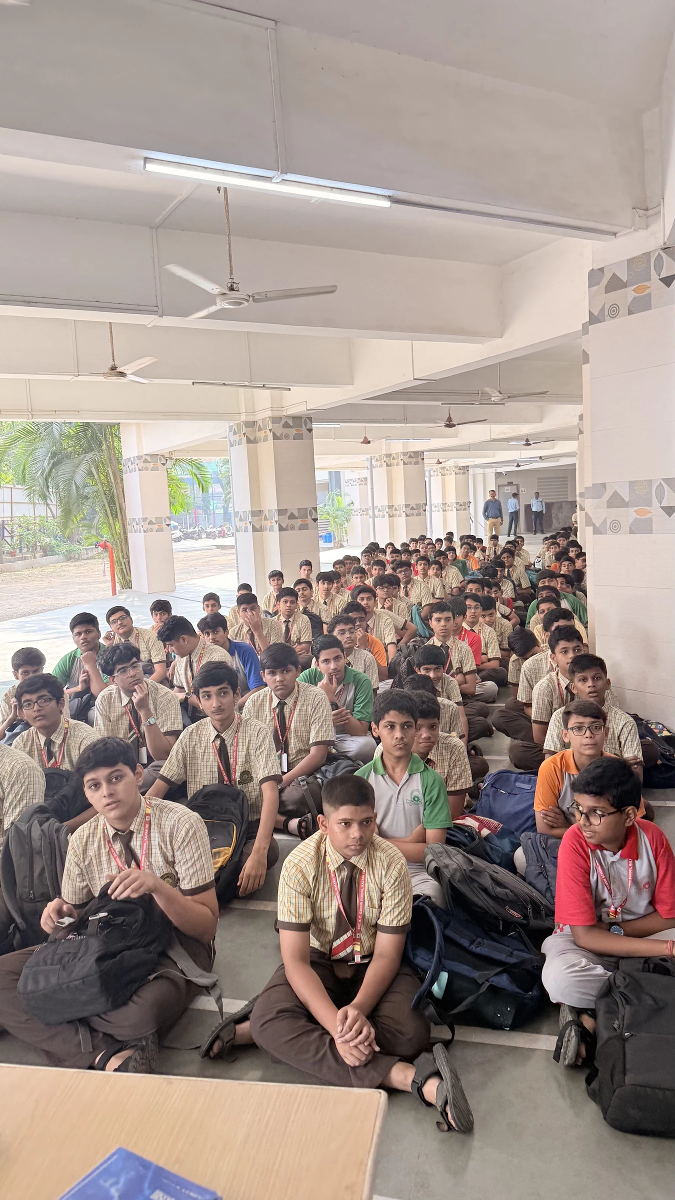 Students seated together for a sustainability talk at the school