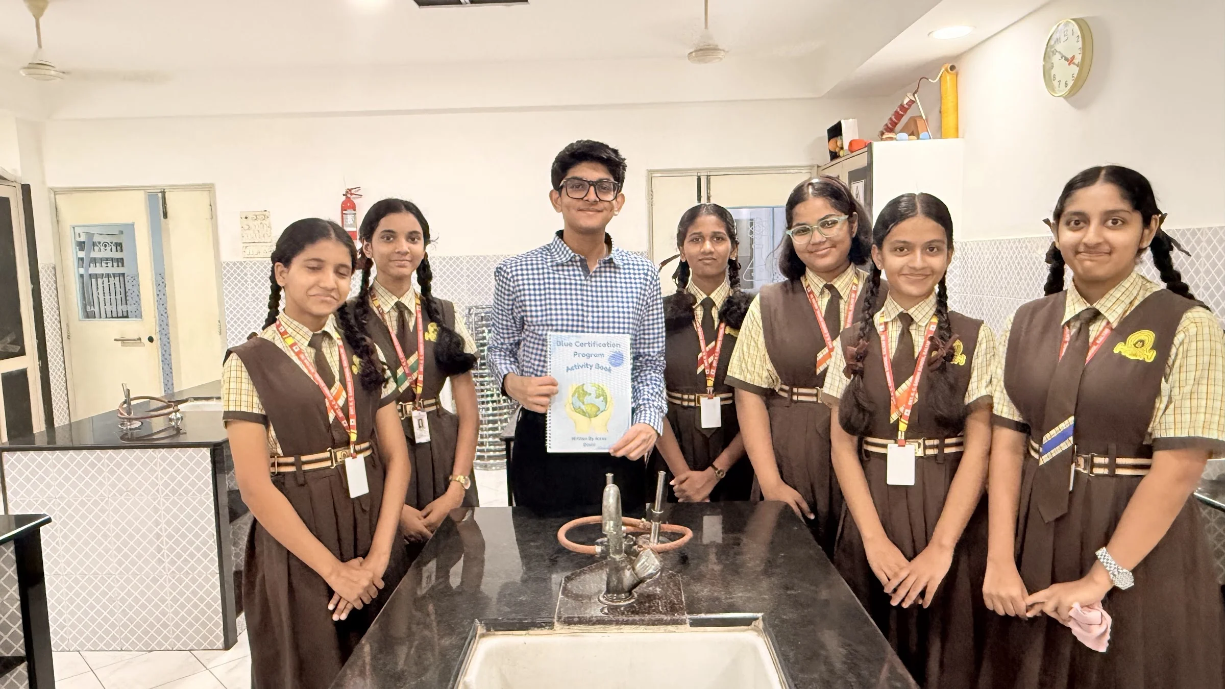 Students and facilitators together in the school laboratory