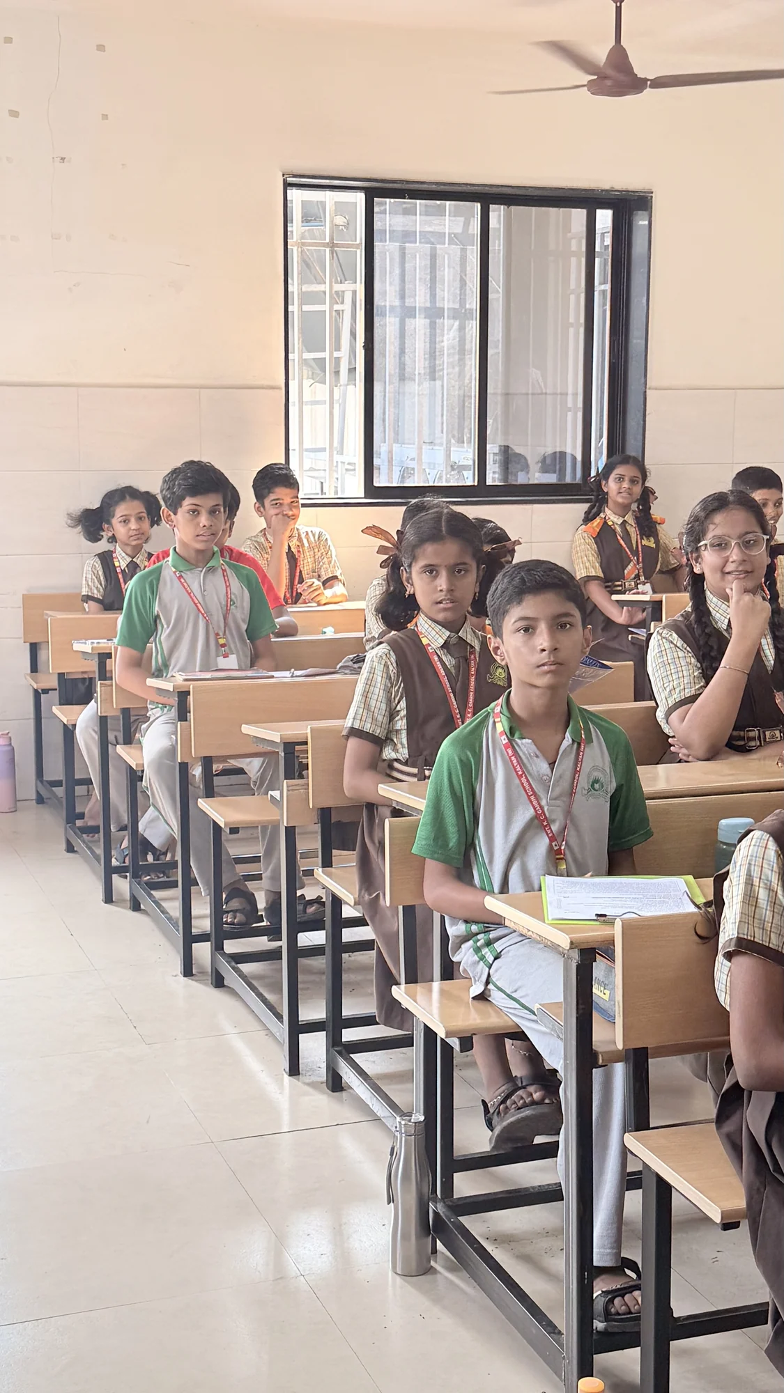 Students seated at their desks at the partner school